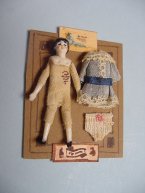 Antique Style Doll with Clothes on Card