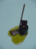 Rusty Mop Bucket with Mop on floor in water